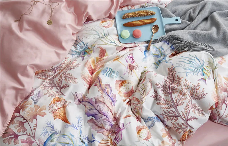 Top view of the seashell print duvet cover on a bed