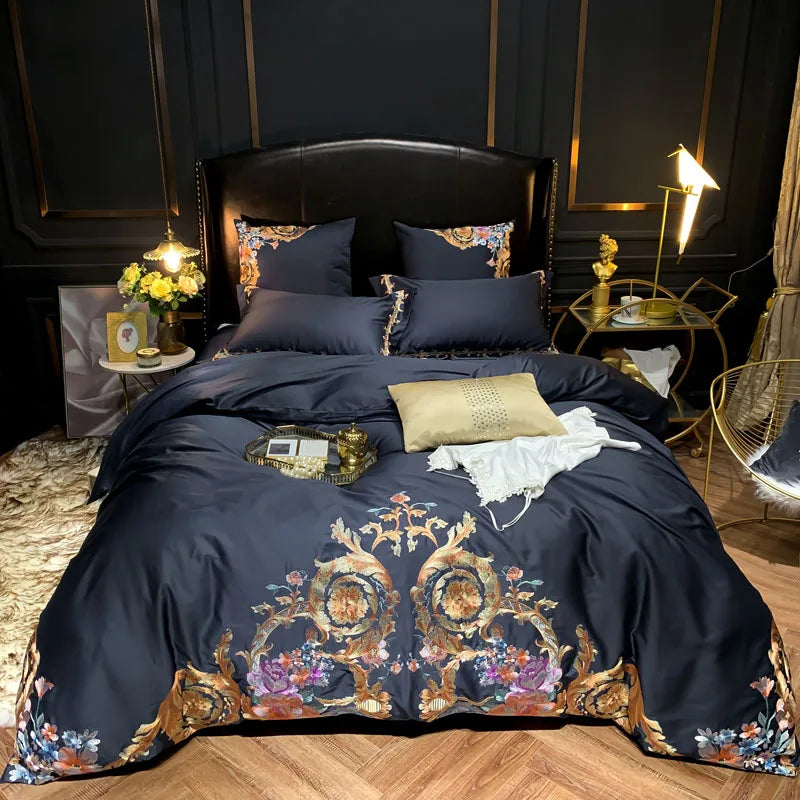 Navy blue embroidered Egyptian cotton bedding set on a bed with gold baroque embroidery