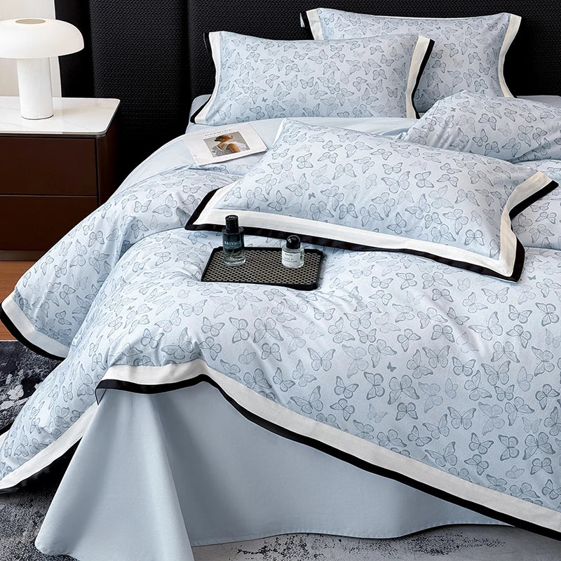 Butterfly print Egyptian cotton bedding set on a bed