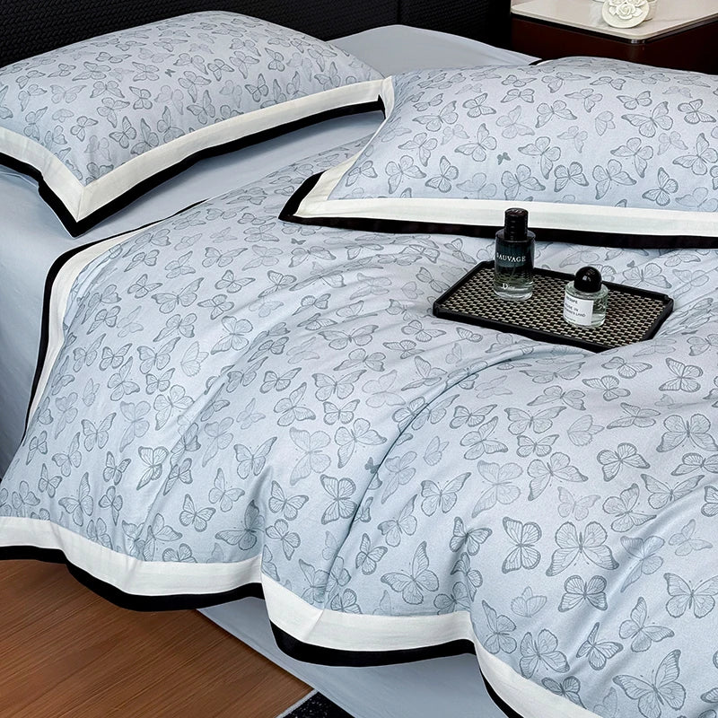 Brushed cotton bedding set folded with butterfly print