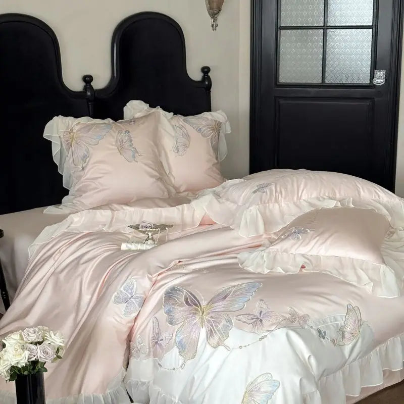 Blush pink butterfly embroidered cotton bedding set with ruffle edge