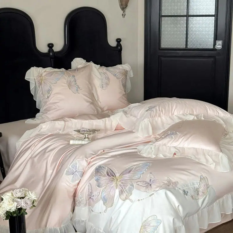 Blush pink butterfly embroidered cotton bedding set with ruffle edge