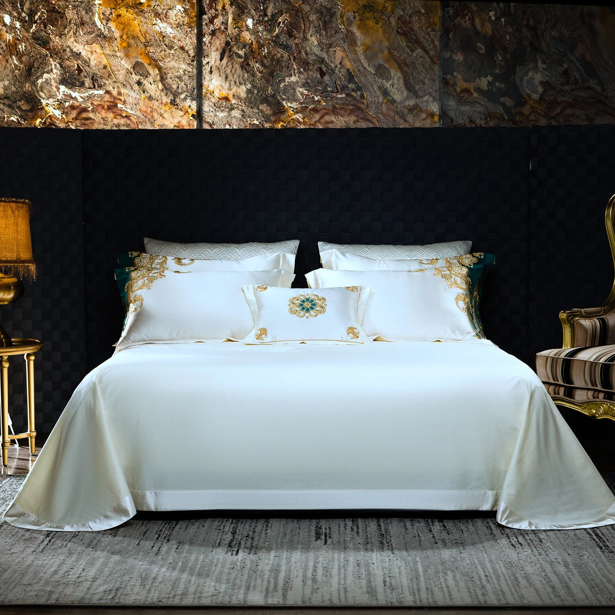 Ivory flat sheet and pillowcases on a made bed