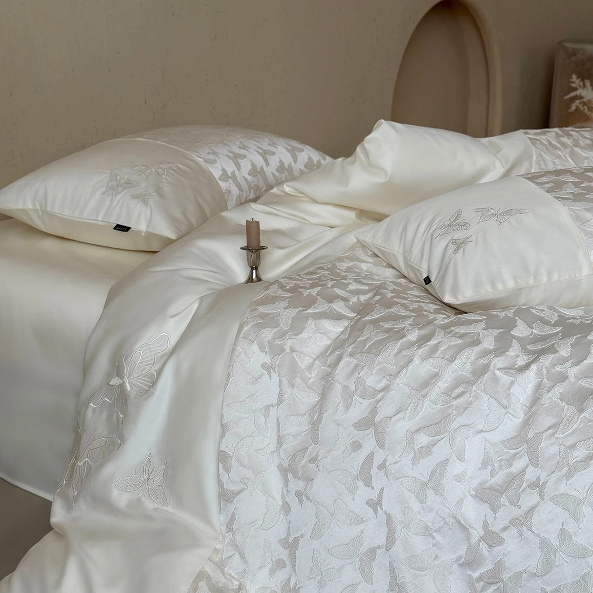 Butterfly jacquard pillowcases and plain ivory sheet