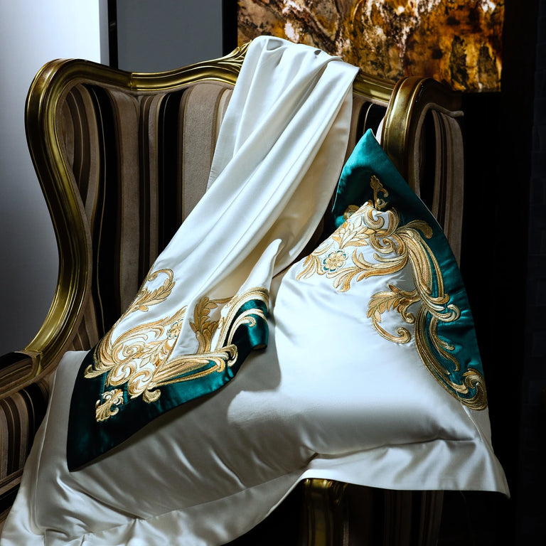 Embroidered duvet cover draped over a chair