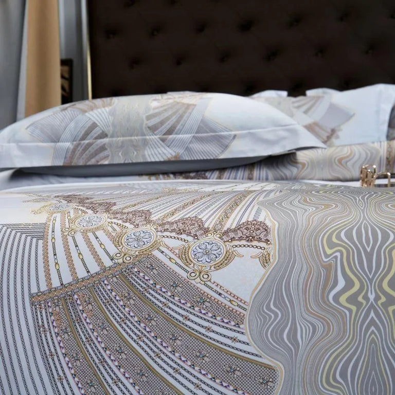 Close up of the gold and taupe fan print on satin cotton