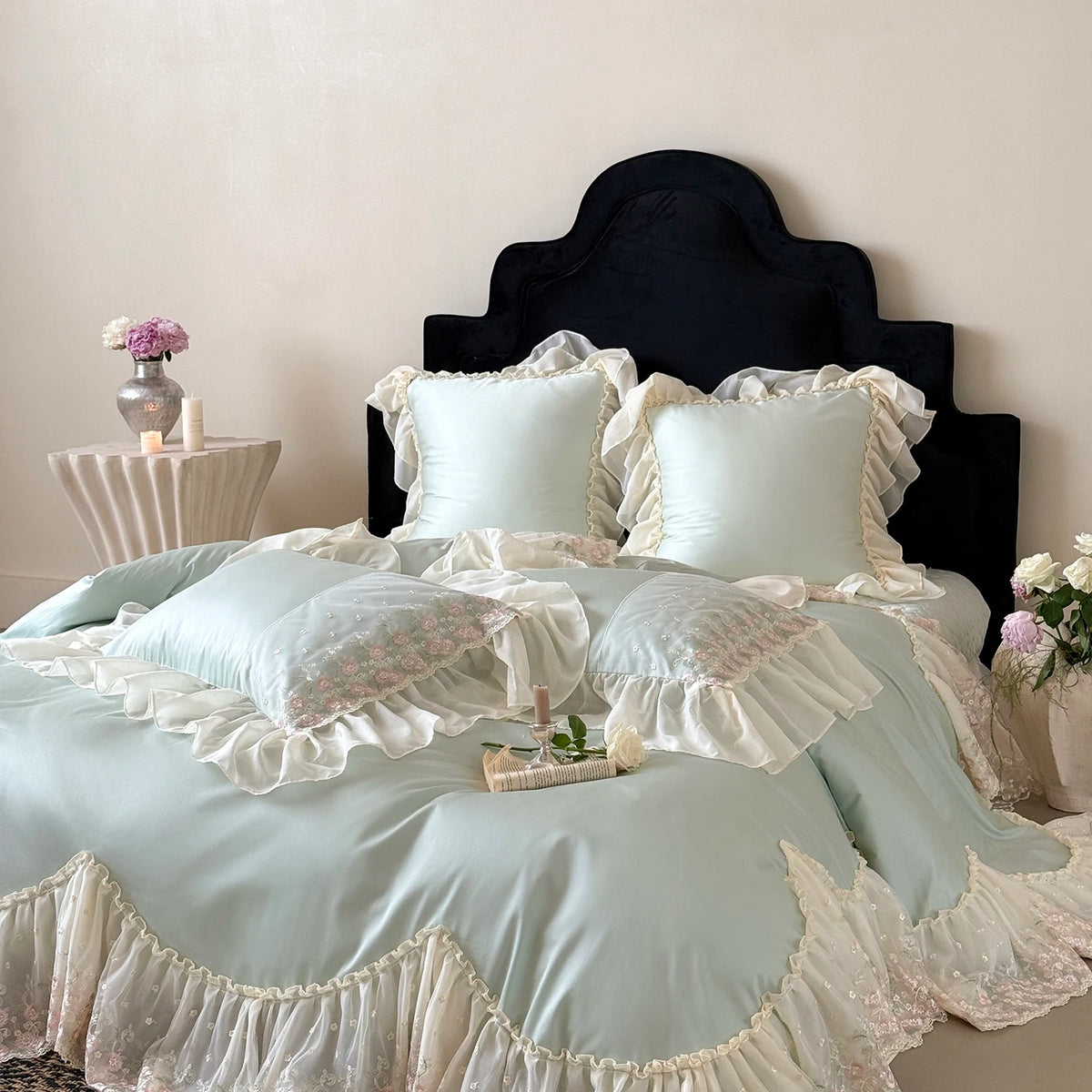 Mint pillowcases with ruffled lace borders