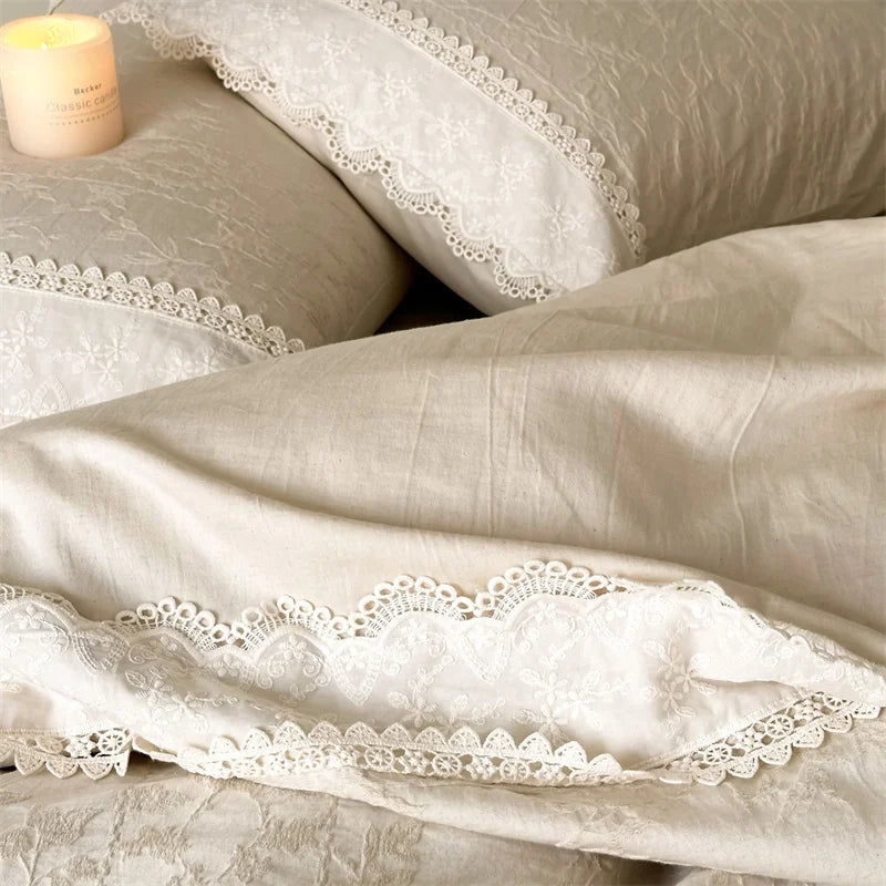 Close up of the crochet style lace trim on a pillowcase
