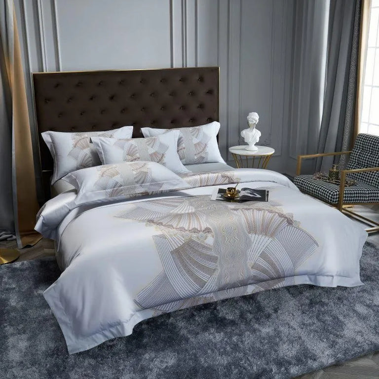 Fan print duvet cover and pillowcases styled in a grey bedroom