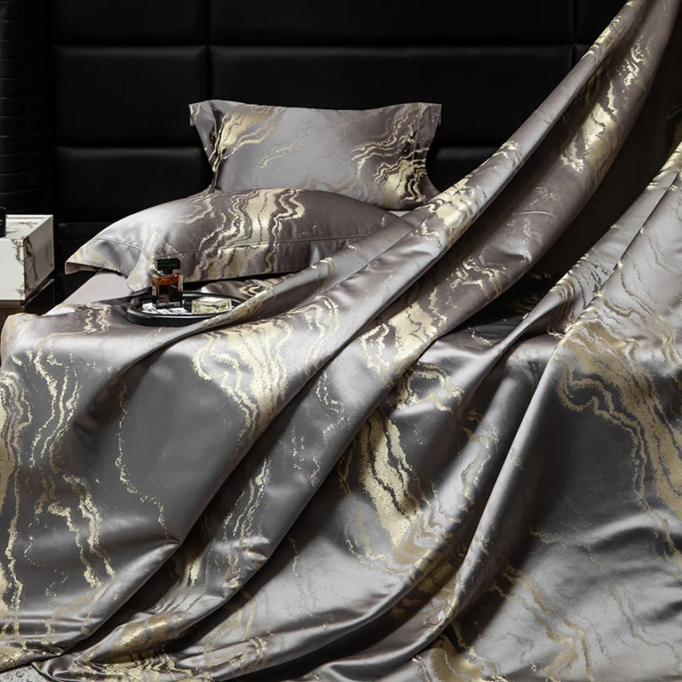 Gold Marble pillowcases and duvet cover on a bed
