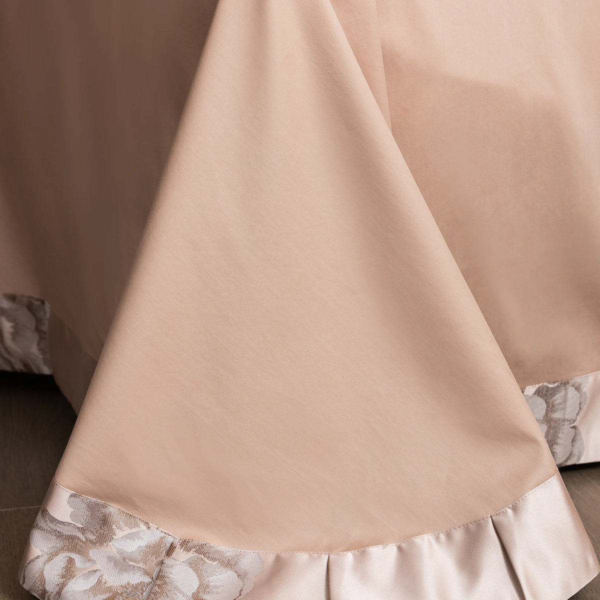 Plain satin sheet with a ruffled style embroidered hem